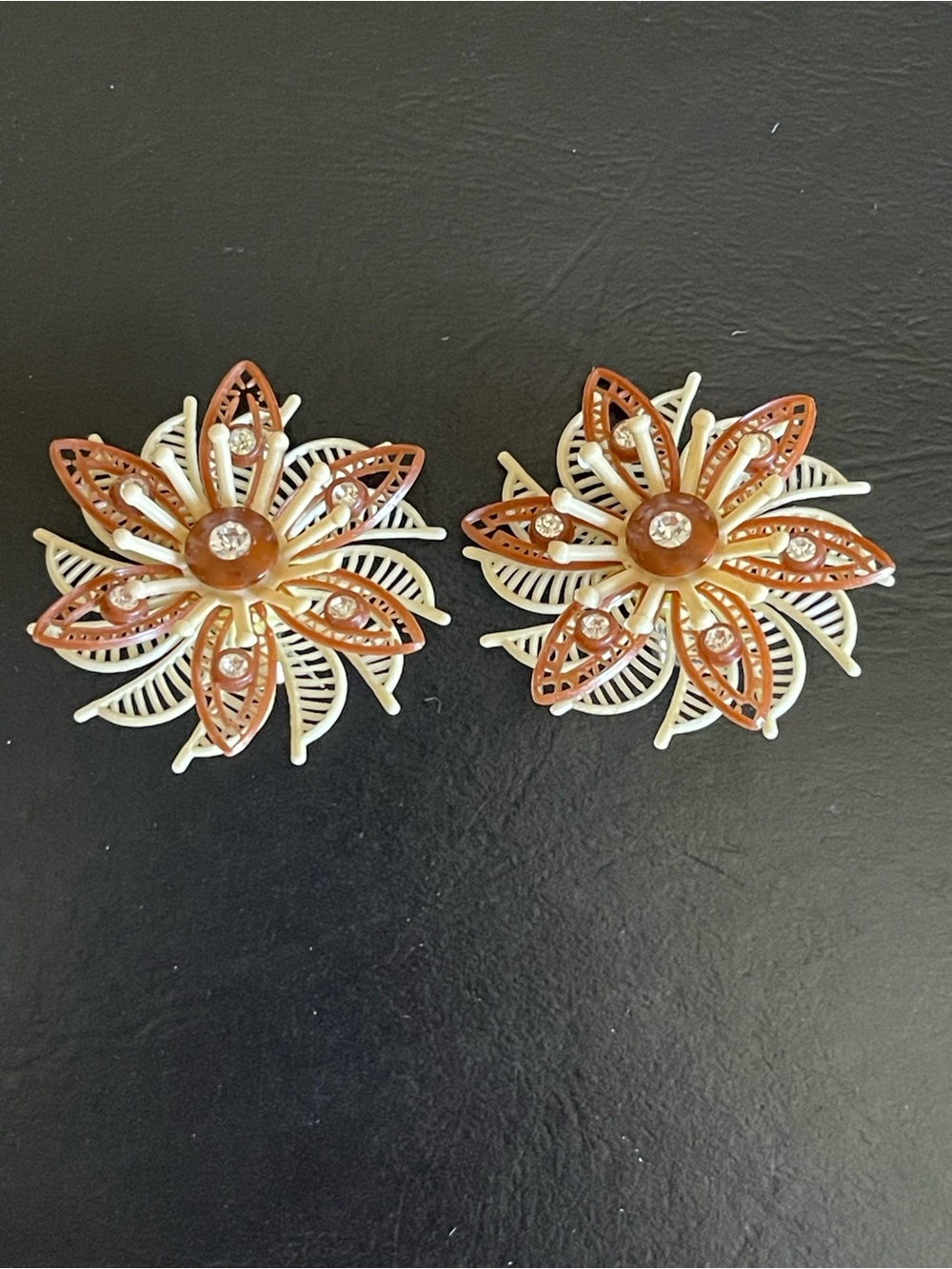 Vintage west Germany plastic AB rhinestone clip on earrings.